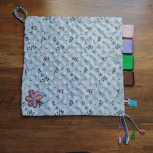 Doudou Incontournable "Jour fleuri"